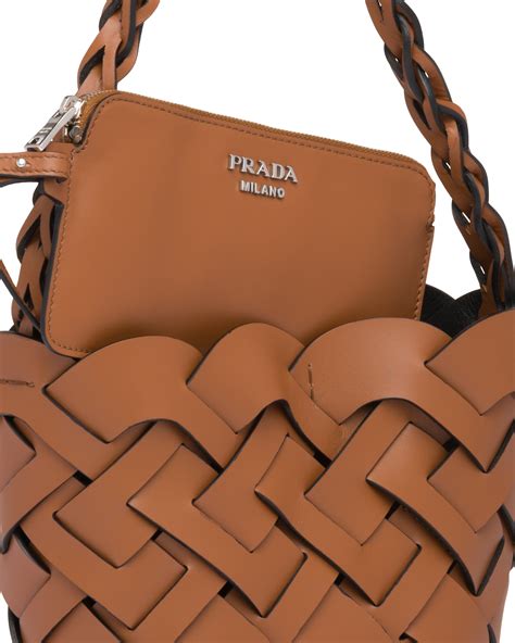 prada leather handbag with large woven motif|genuine leather Prada bags.